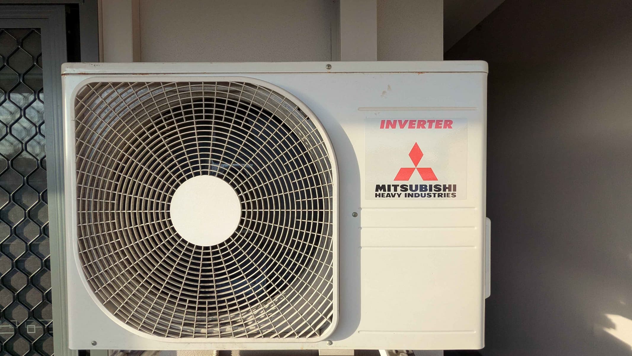 Modern air conditioning unit outside a home